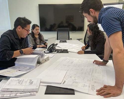 Interior of Mexico City office collaboration in conference room and team members